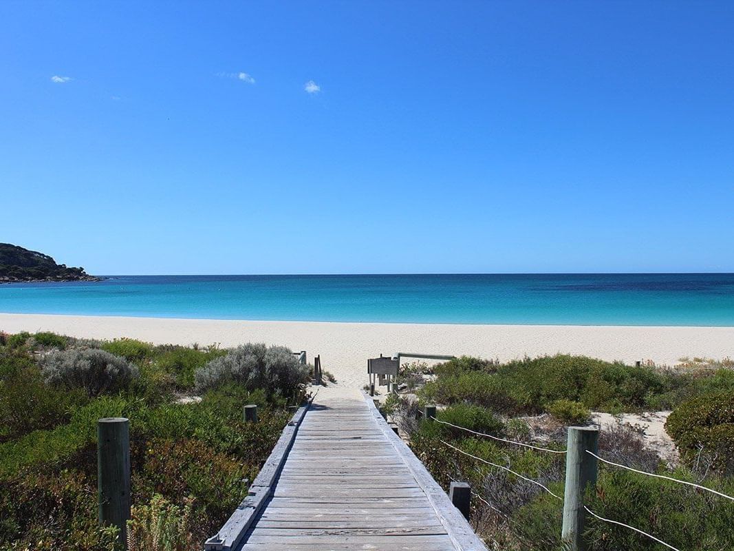 View of the beach entrance at  Pullman Bunker Bay Resort