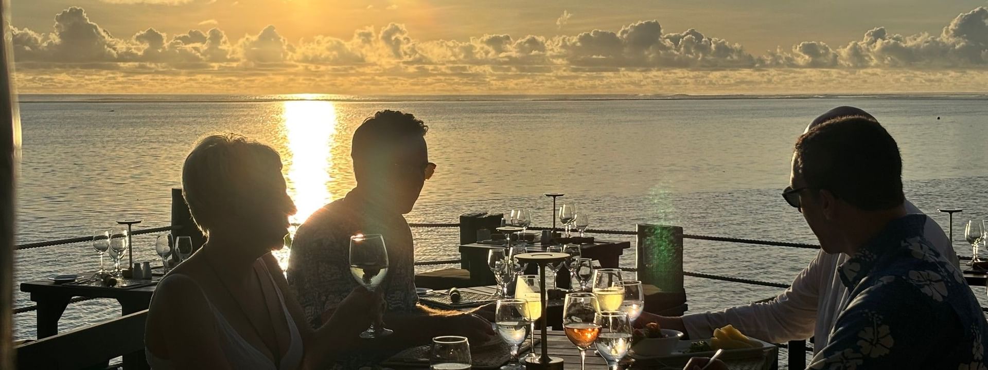 People dining at Wicked Walu with ocean views at Warwick Fiji Resort and Spa, Korolevu