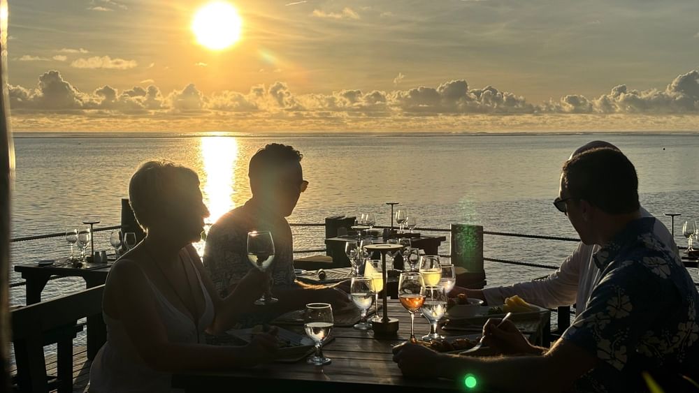 People dining at Wicked Walu with ocean views at Warwick Fiji Resort and Spa, Korolevu.