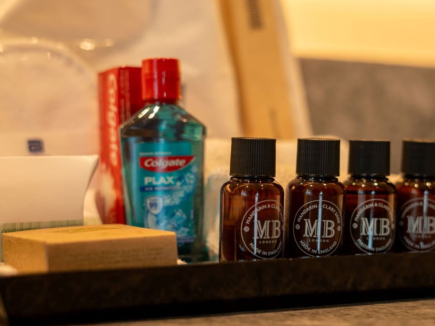 King Junior Suite bathroom amenities with toiletries and mouthwash at Camino Real Fashion Drive Monterrey