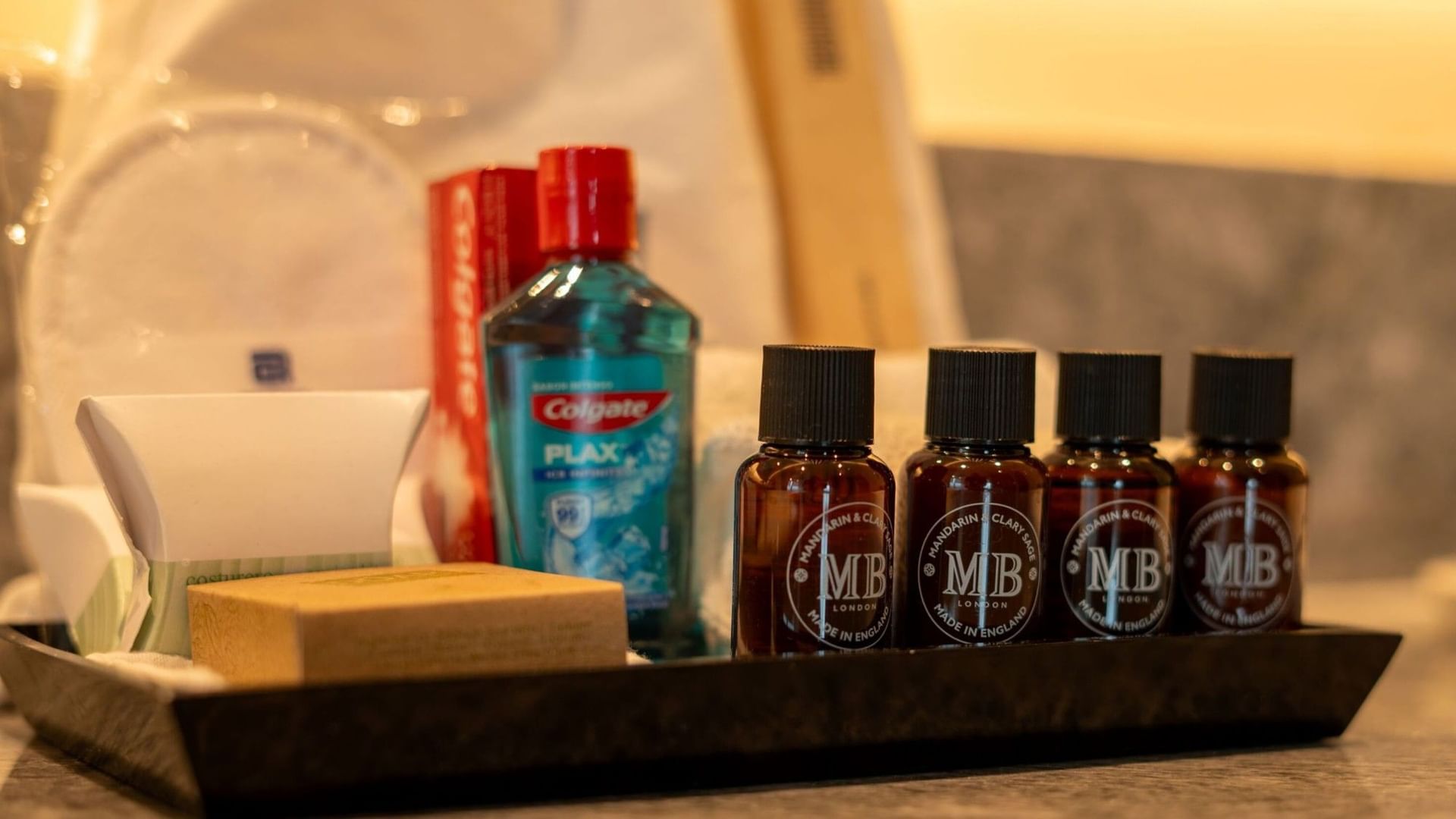 King Junior Suite bathroom amenities with toiletries and mouthwash at Camino Real Fashion Drive Monterrey