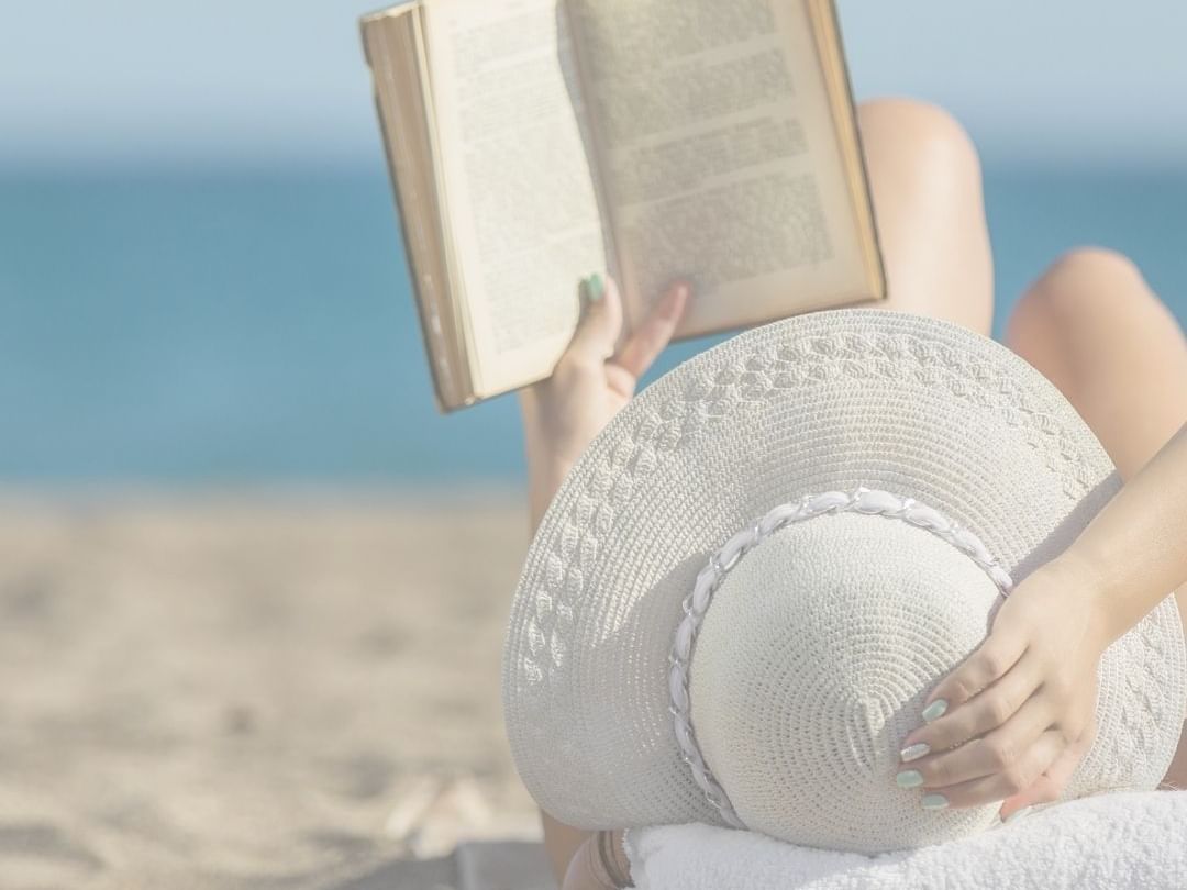 Woman reading on the beach