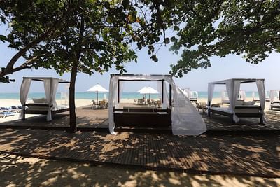 Cabanas in the beach at Blue JackTar Hotel
