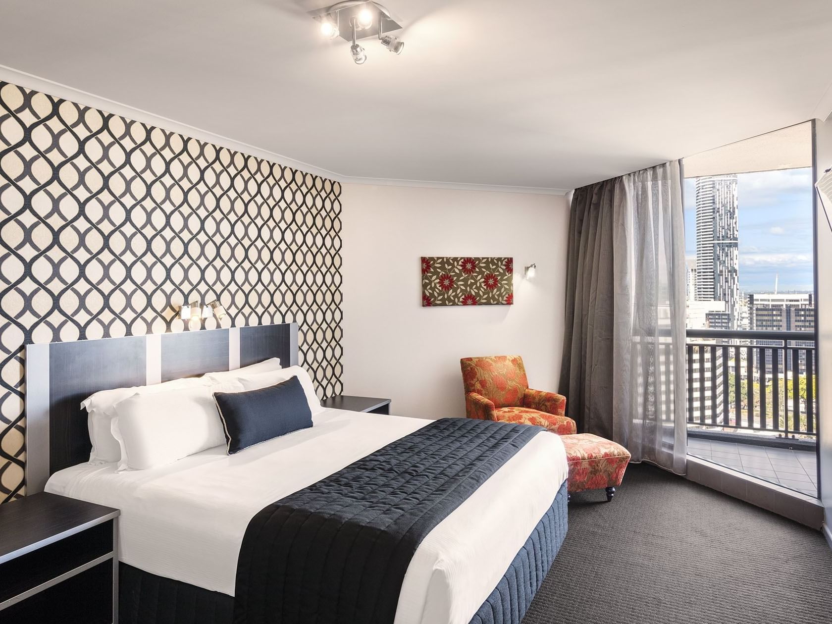 King bed in Superior Suite Bedroom at Grand Chancellor Brisbane