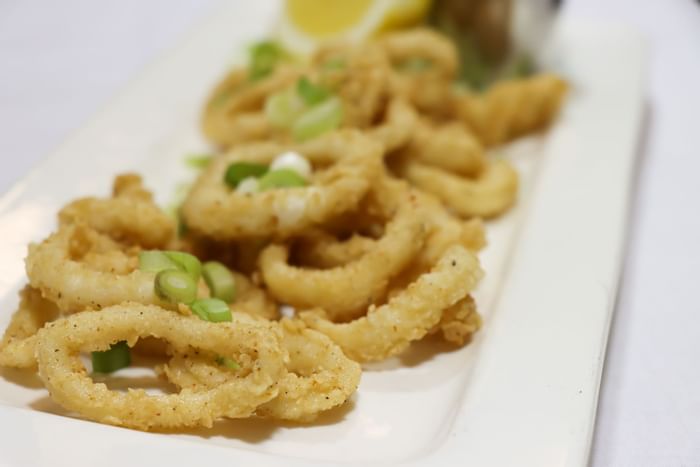 Close-up of fried calamari plate served at Hotel Halifax
