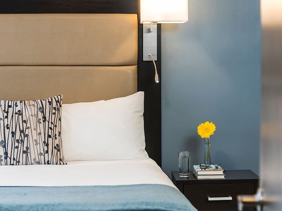 room with bed and nightstand