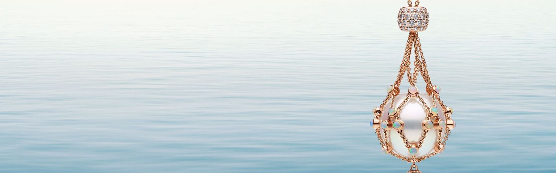 Background image of chandelier earrings with diamonds against a tranquil water used by Crown Towers Sydney