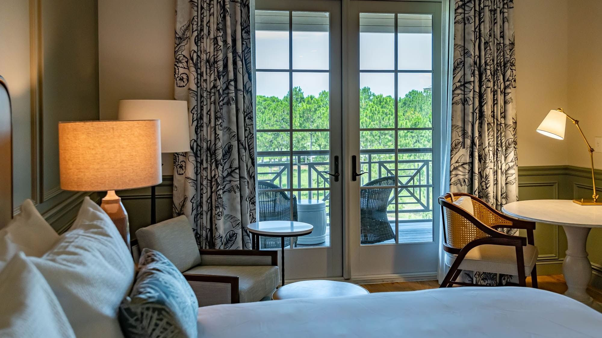 Balcony lounge view from the king bed in Golf View King Room at Camp Creek Inn