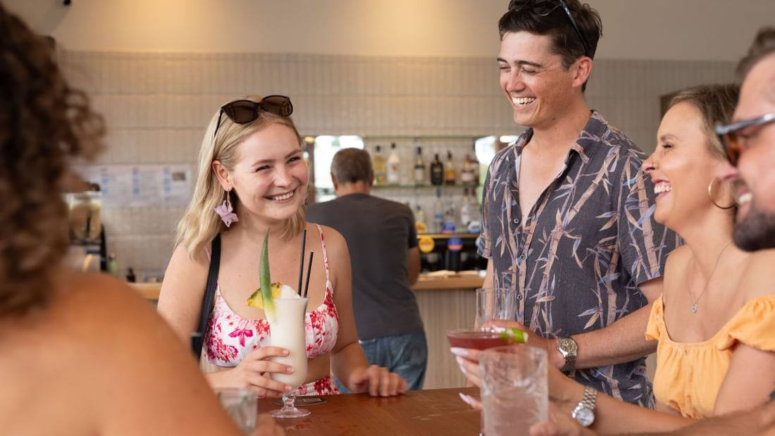 Friends having enjoyable time in Splash Cafe at Novotel Darwin Airport