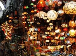 Grand Bazaar, Istanbul: Largest and oldest covered marketplace in the world, bustling with shops selling carpets and more.