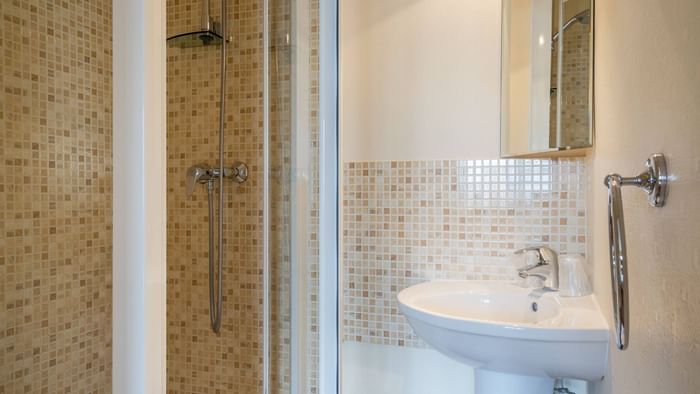 Interior of the bathroom in a room at Hotel Napoleon