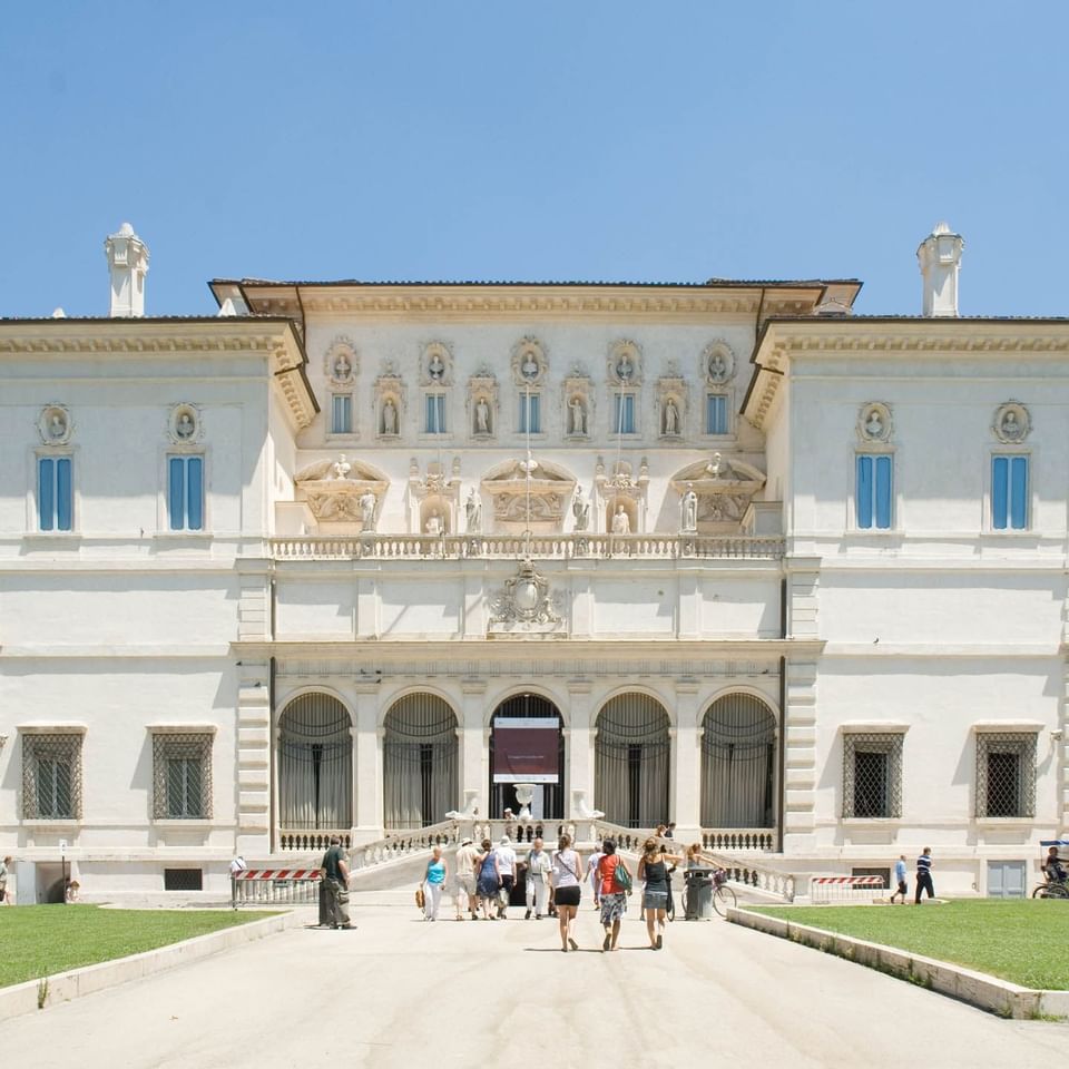 Exterior view of the Galleria Borghese on a sunny day near The Independent