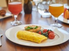 Close-up of a breakfast served with juice at Gamma Hotels