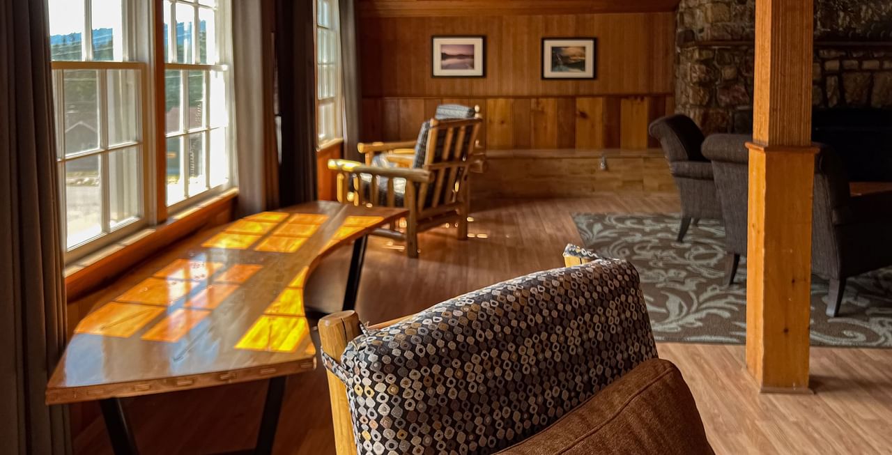 Activity room with chairs, couch, and tables