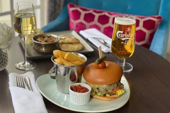 Burger and curry from the bar menu at Gorse Hill in Surrey