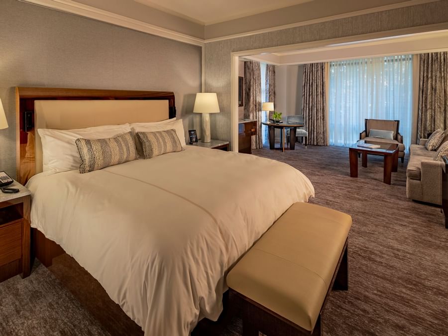 Plush queen bed & cozy interior in Studio Suite at The Umstead Hotel and Spa
