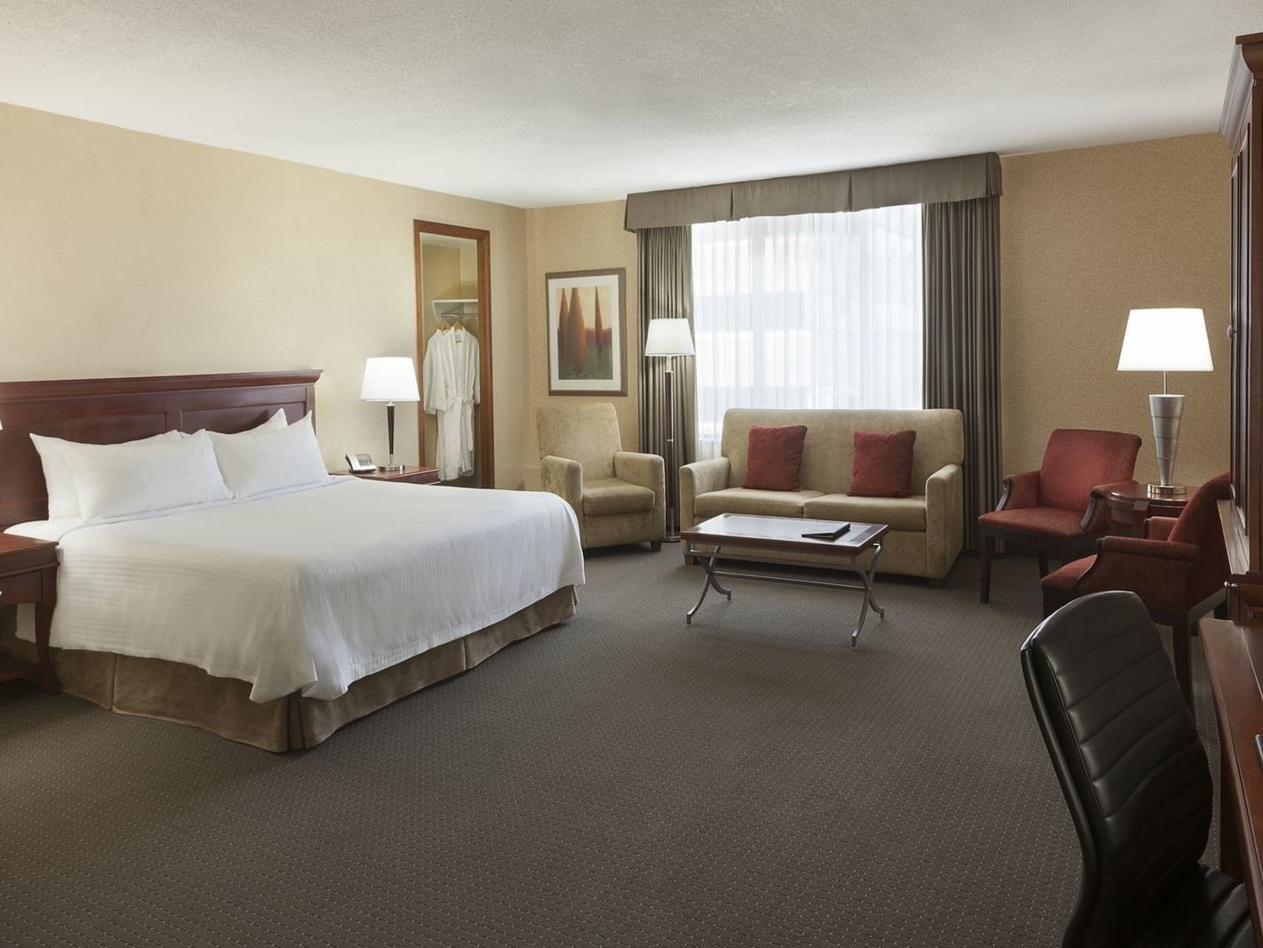 Bed & furniture in Junior Suite at Hotel Halifax