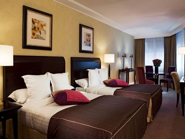 Family Room with two double beds at Warwick Paris Champs Elys.