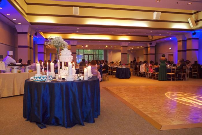 A wedding ceremony in a ballroom at Kellogg Conference Center 