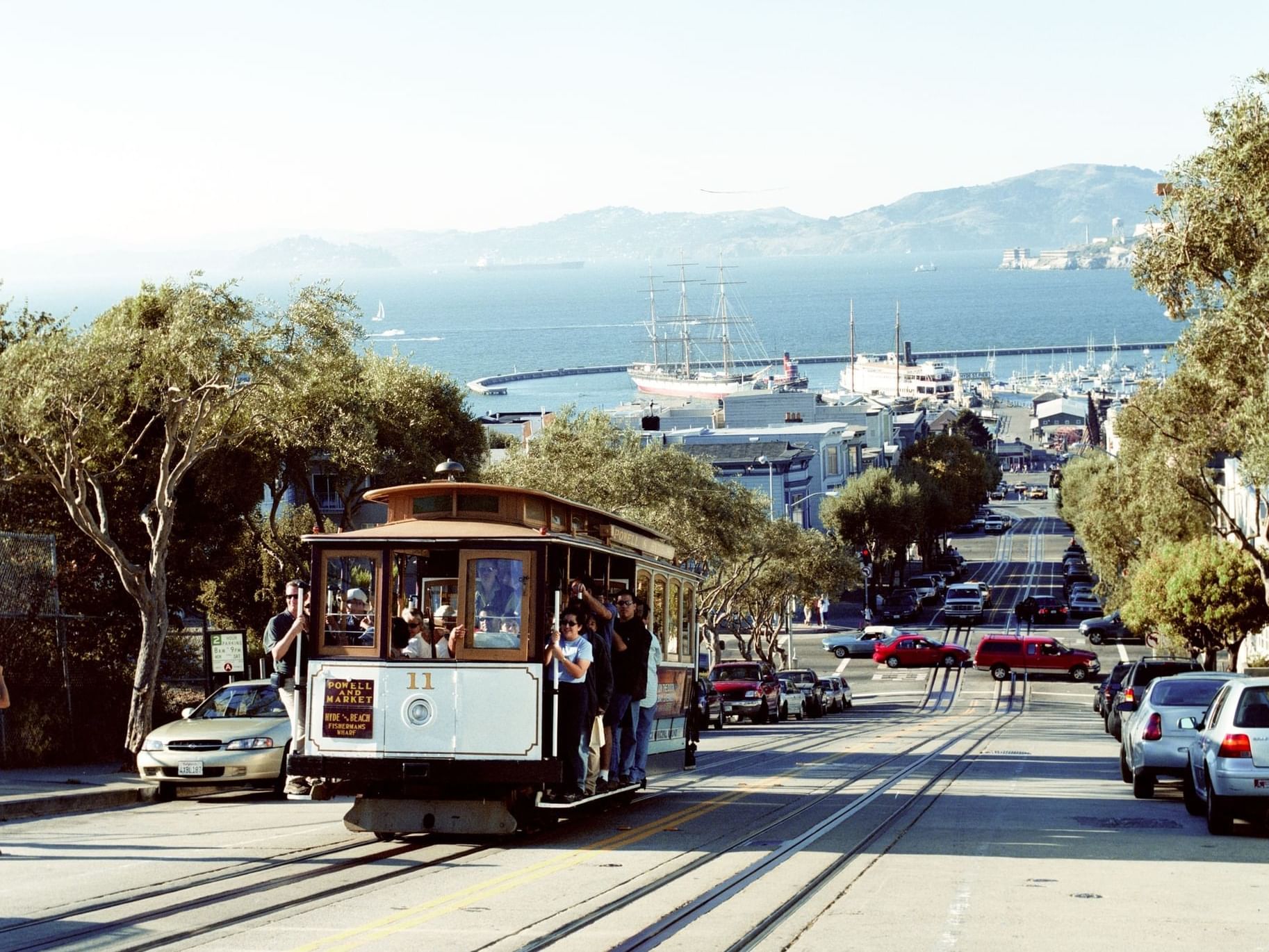 San Francisco city with cable cars running on F-line and vehicles on the road near Becks Motor Lodge