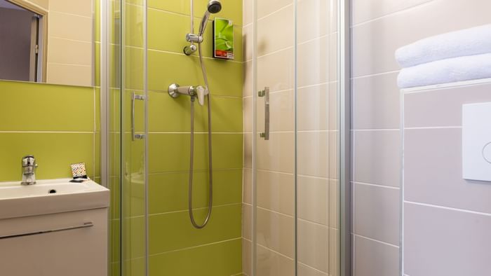 Interior of a bathroom in a room at Hotel Marseille Airport