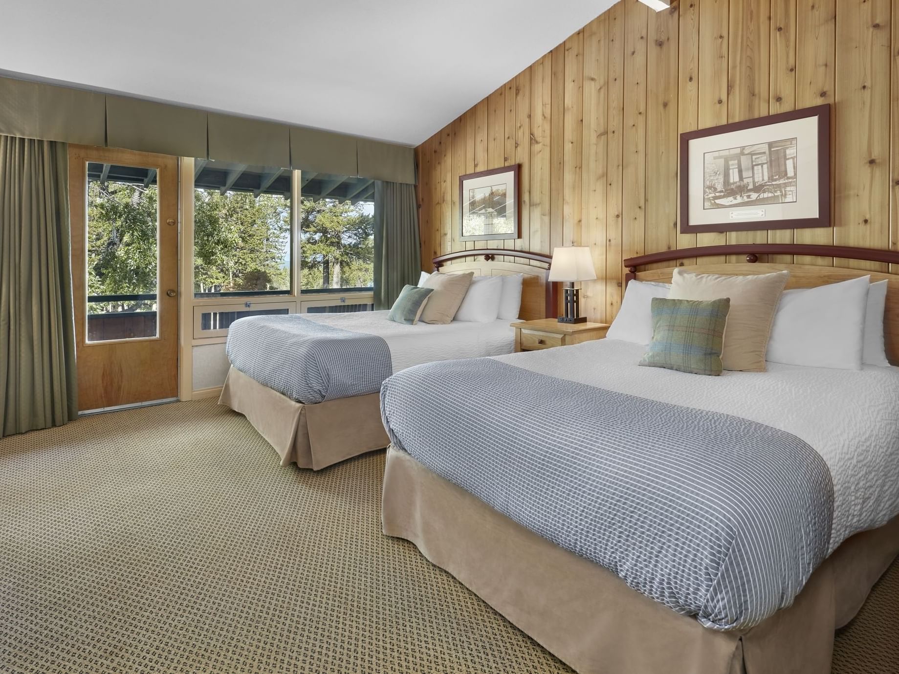 Cozy beds arranged in Classic Family Suite at Fairmont Hot Springs Resort