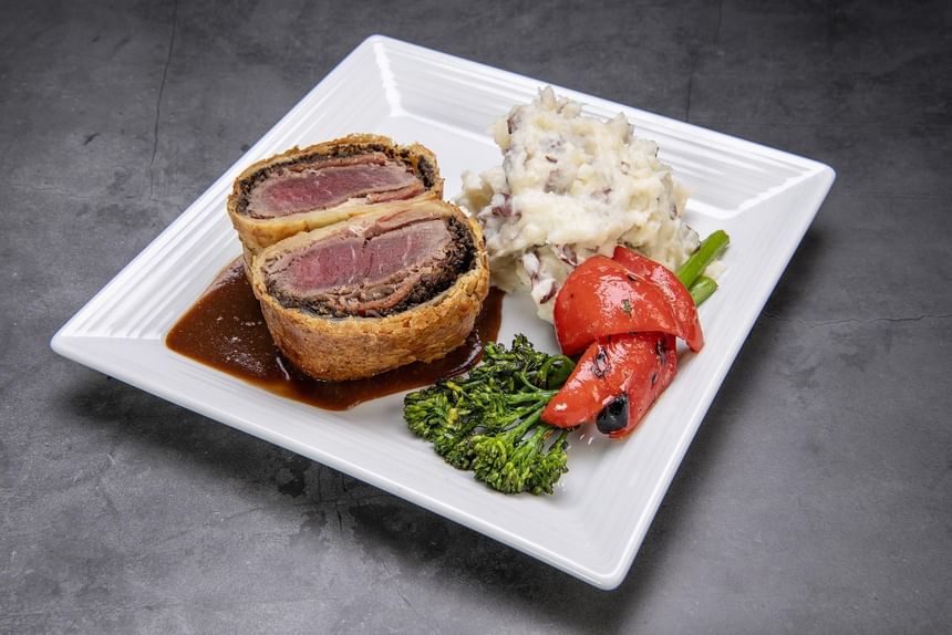 Steak dish with mashed potatoes and vegetables served in Hardwood's Restaurant at Temple Gardens Hotel & Spa