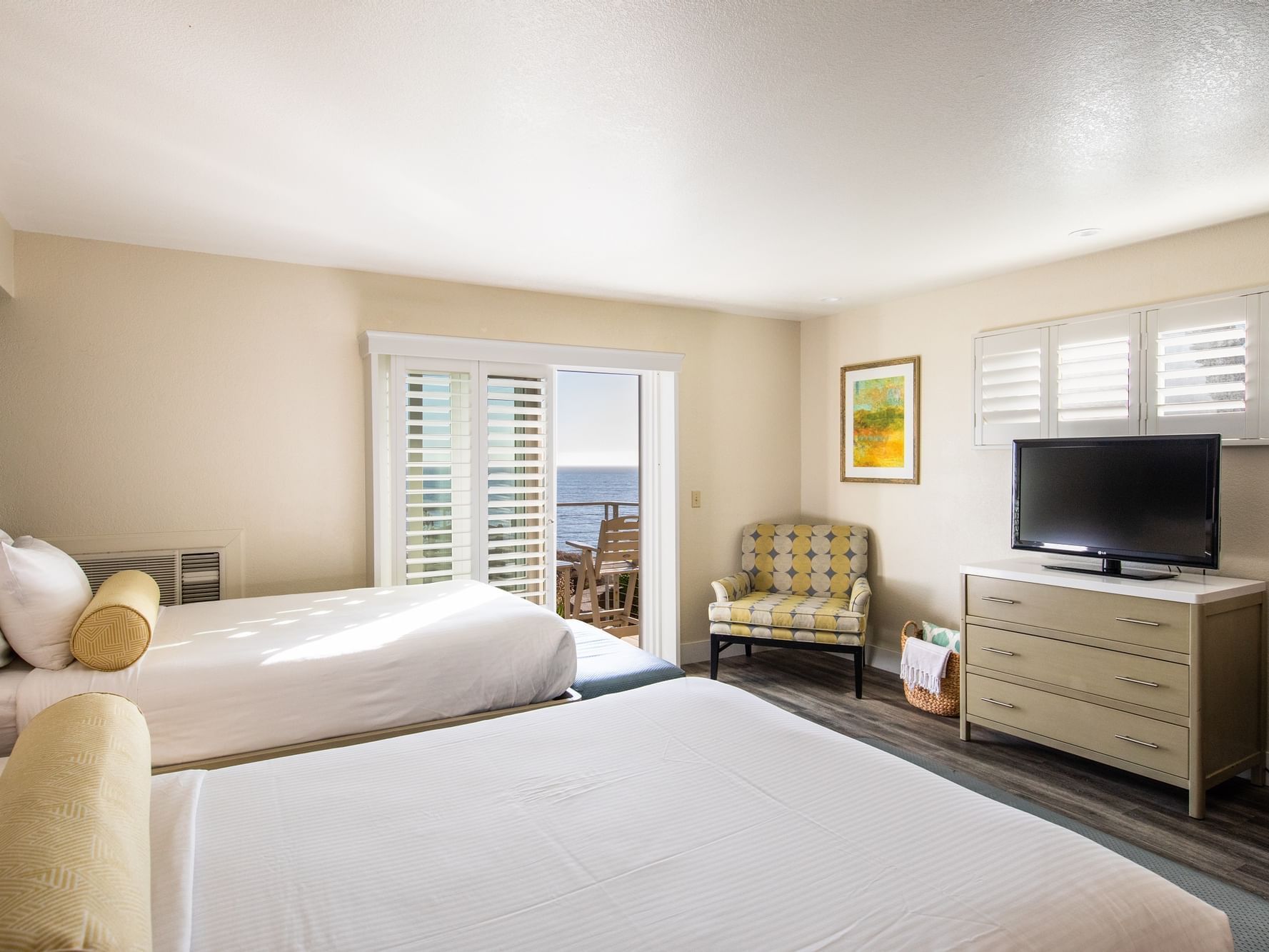 Oceanfront two double accessible room with two beds, TV, and outside access