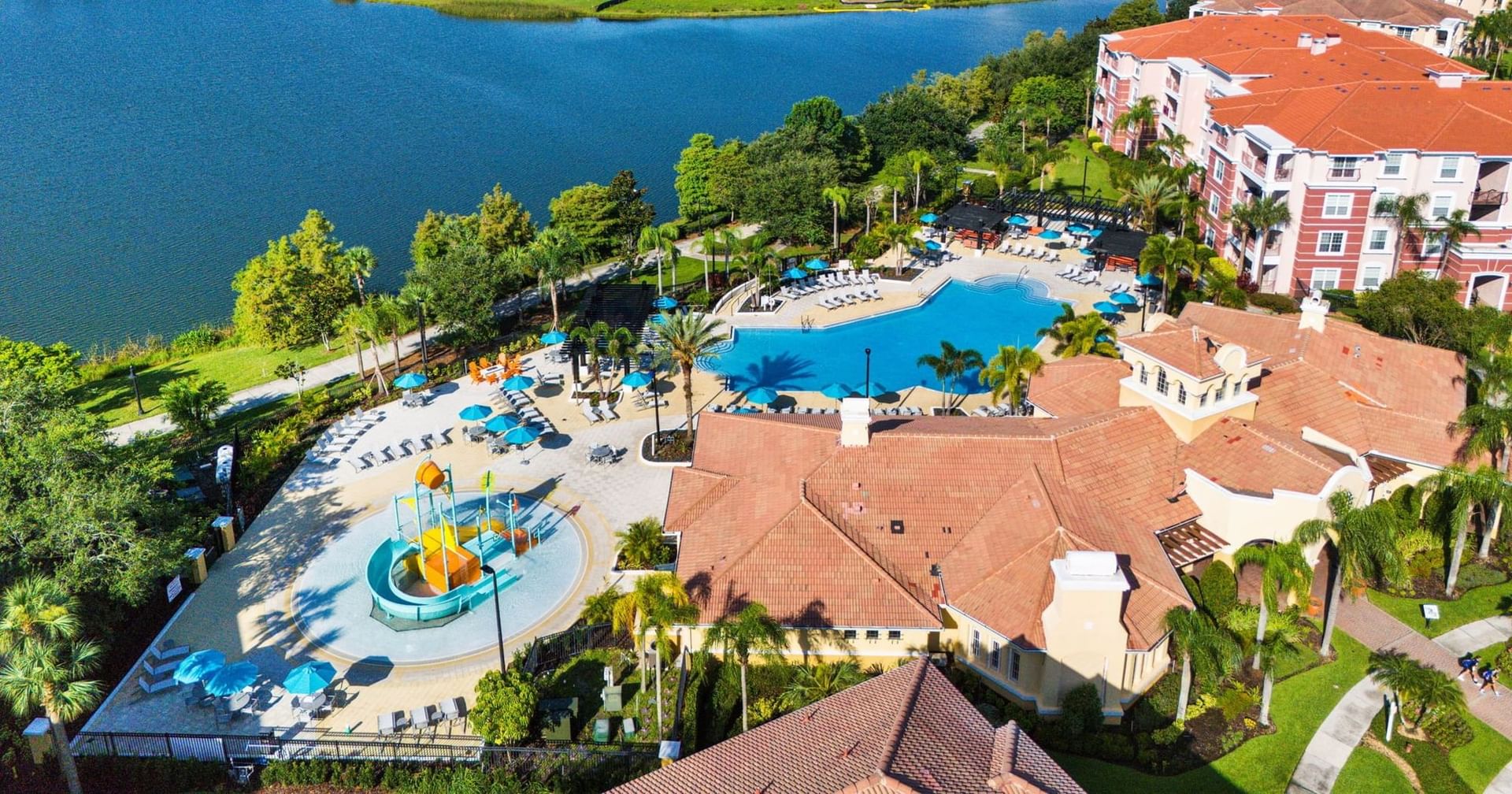 Aerial view of Vista Cay Resort with pool and buildings at Vista Cay Resort By Millenium