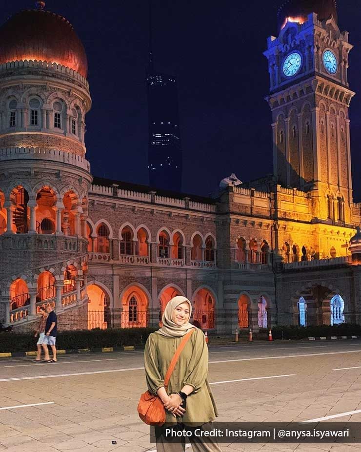 Lady posing in front of Merdeka Square, a historic attraction near Imperial Lexis Kuala Lumpur