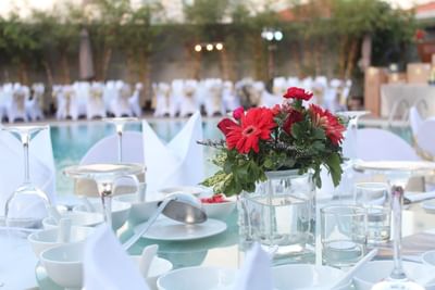 Banquet rounds arranged by the pool at Eastin Grand Hotel Saigon