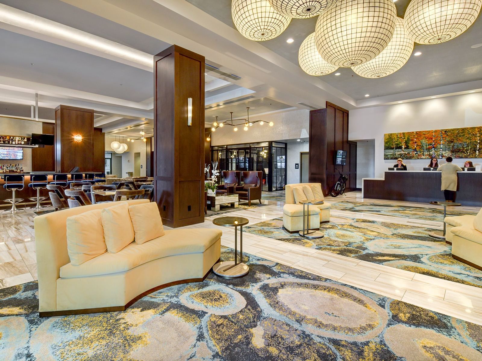 Spacious lobby with the seating area at The Grove Hotel