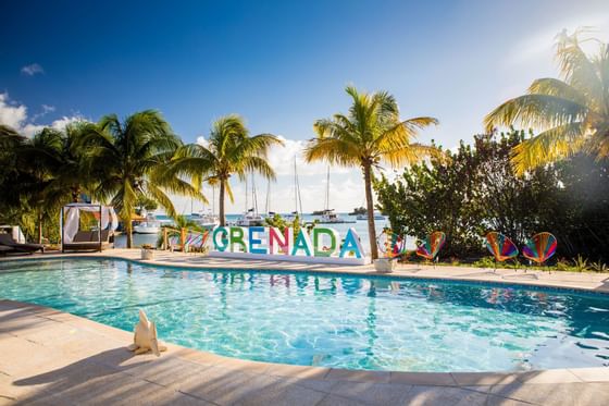 View of the outdoor swimming pool at True Blue Bay Hotel