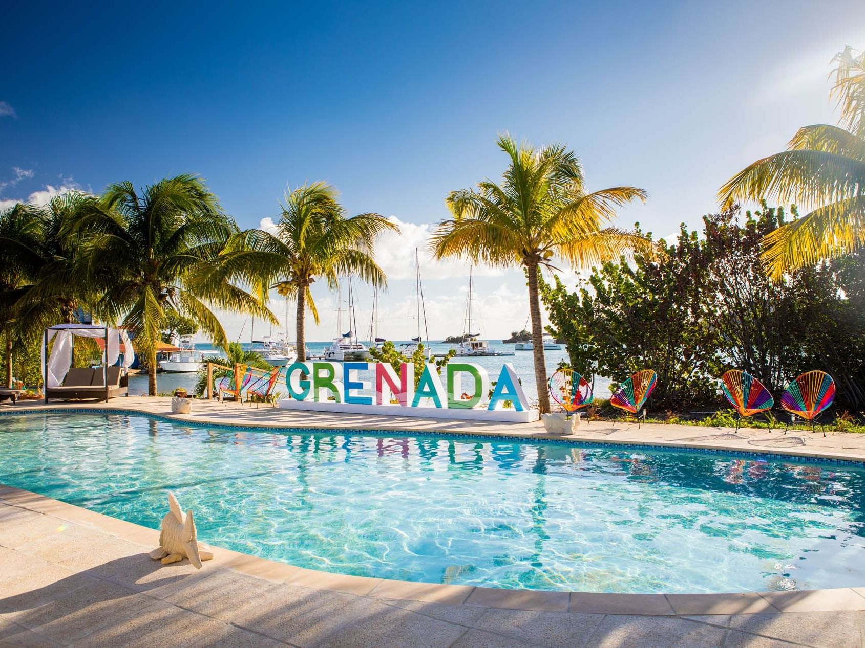 View of the outdoor swimming pool at True Blue Bay Hotel