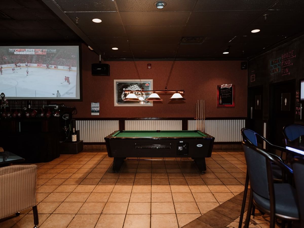 Pool table and large TV at pub
