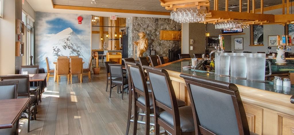 Interior of Guides Lounge with tables and bar