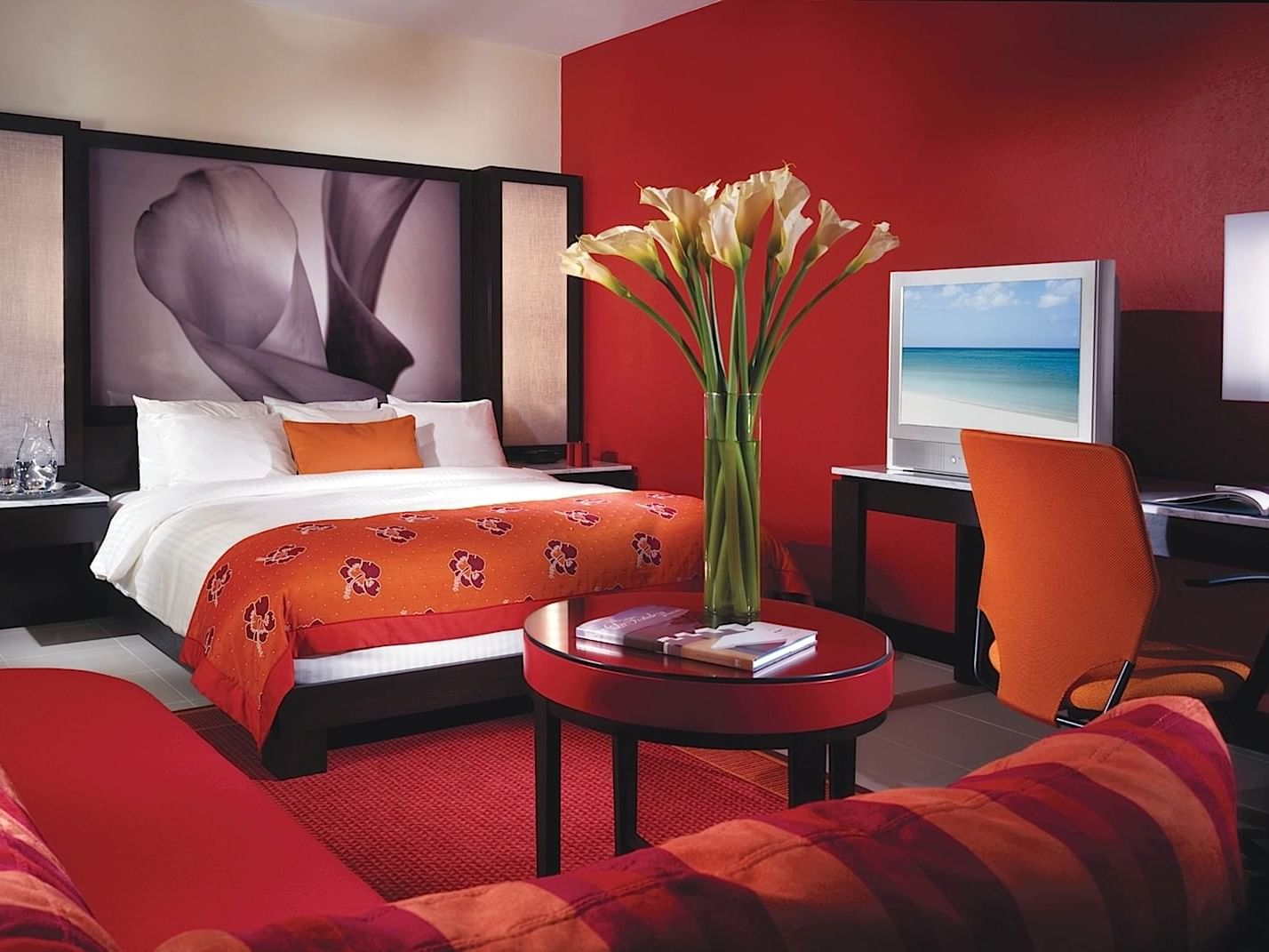 Deluxe Room with a King bed and furniture at Condado Plaza
