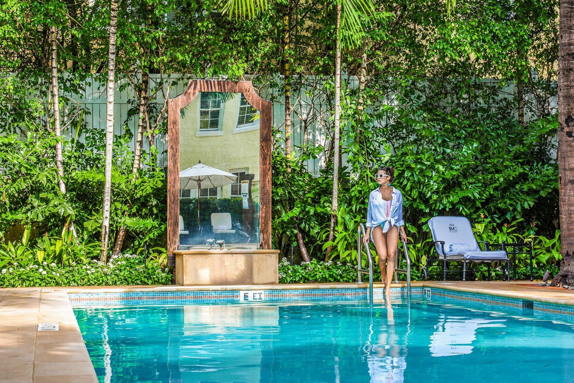 A woman move into the pool at Brazilian Court