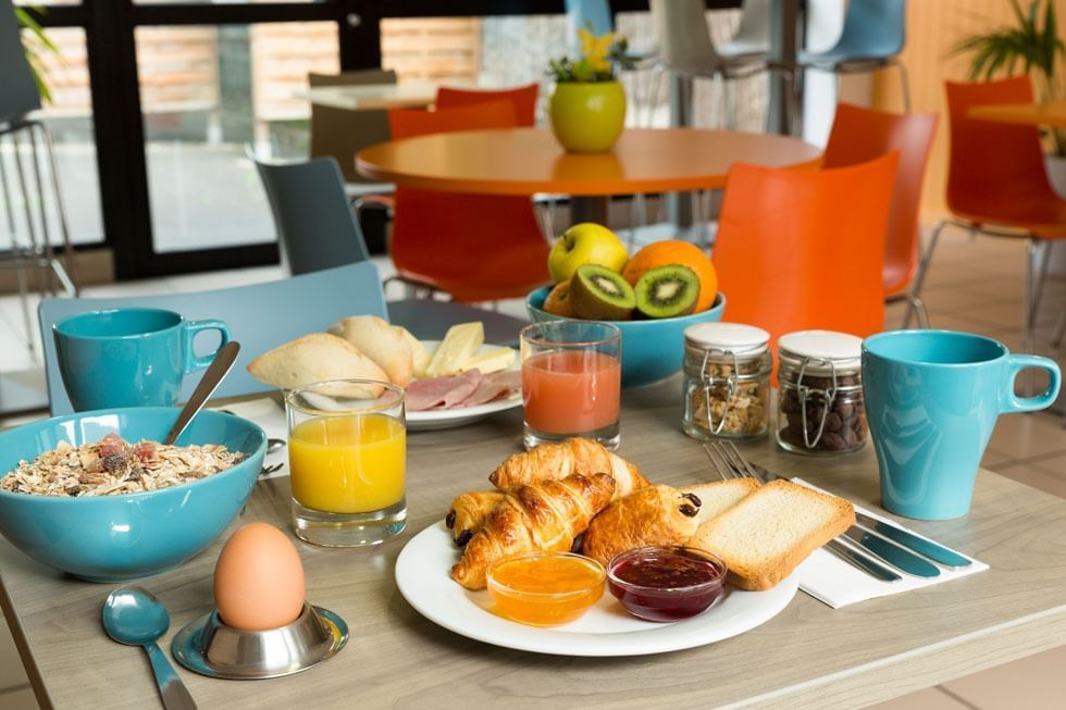 Cereals, Fruit, Eggs and Croissants Breakfast at Hotel Clermont-