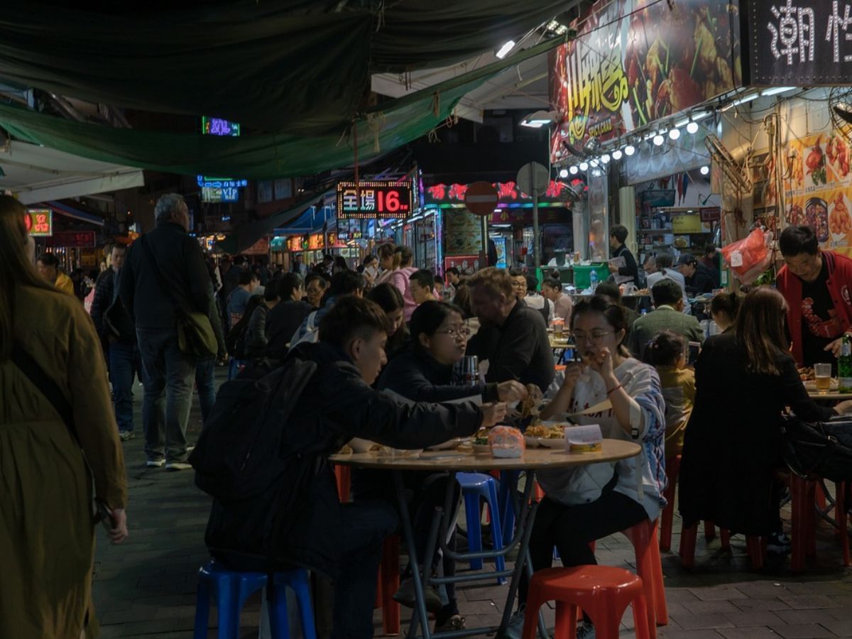 People eating street food in Hong Kong near Park Hotel Hong Kong