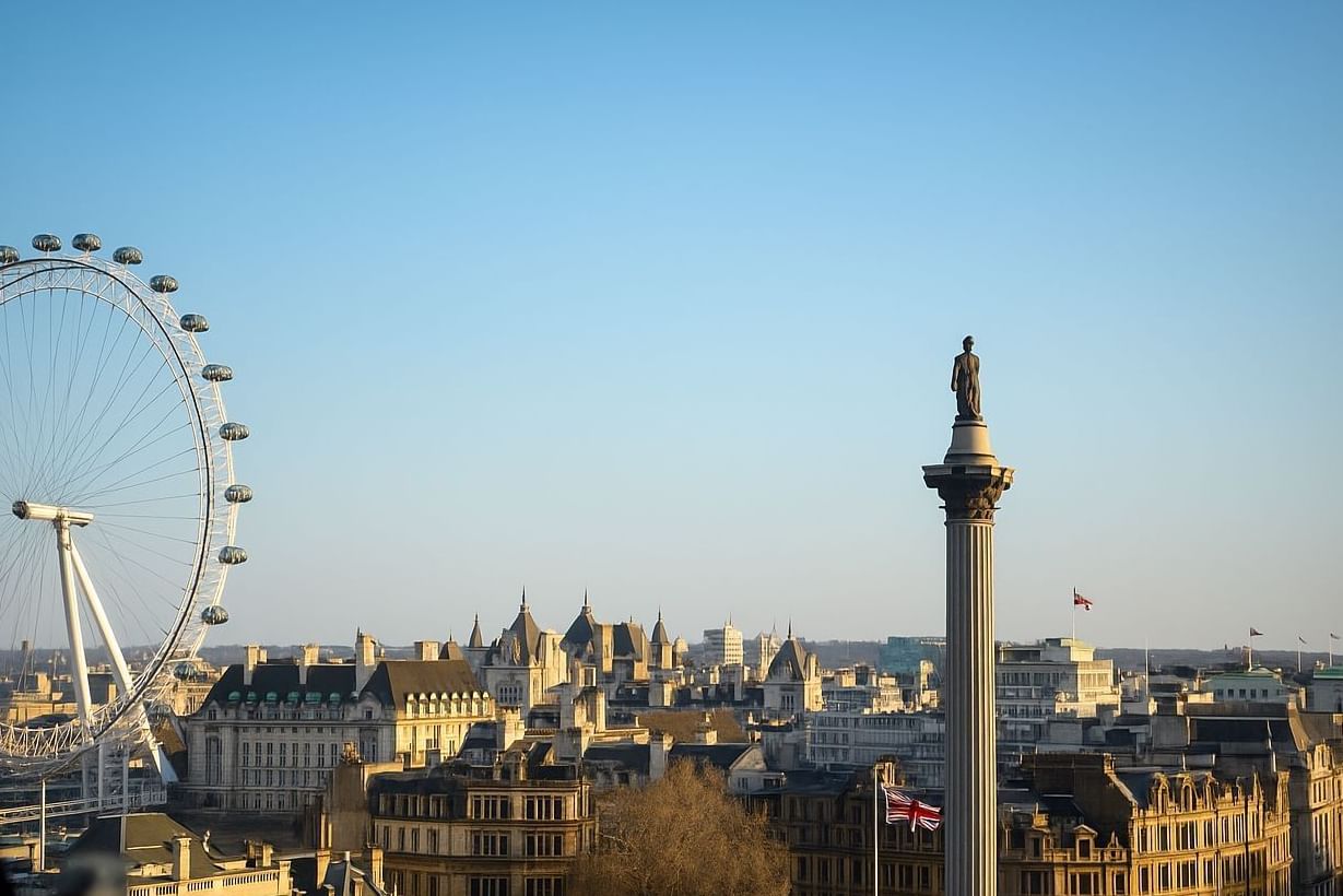 The London skyline featuring the London Eye and Nelson's Column a stunning view near The Londoner Hotel