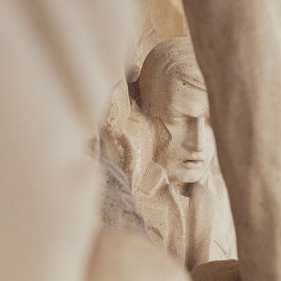Close-up of a giant statue near Falkensteiner Hotels