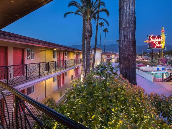 View of the famous neon sign from a guestroom at Safari Inn