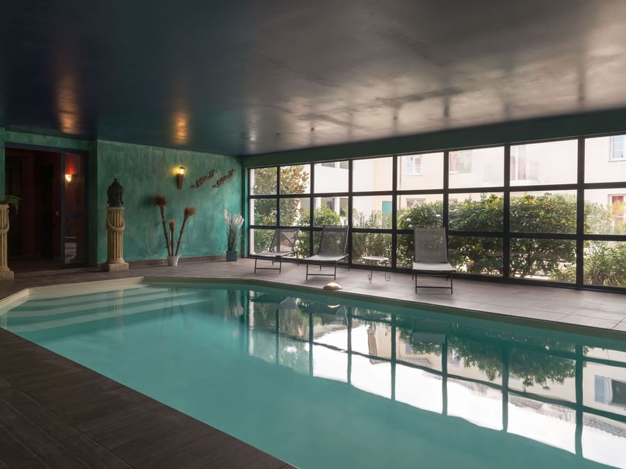 Indoor swimming pool at Hotel le village provencal