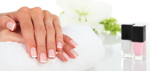 Lady's hand with a Spa Manicure treatment at Abidah Hotel