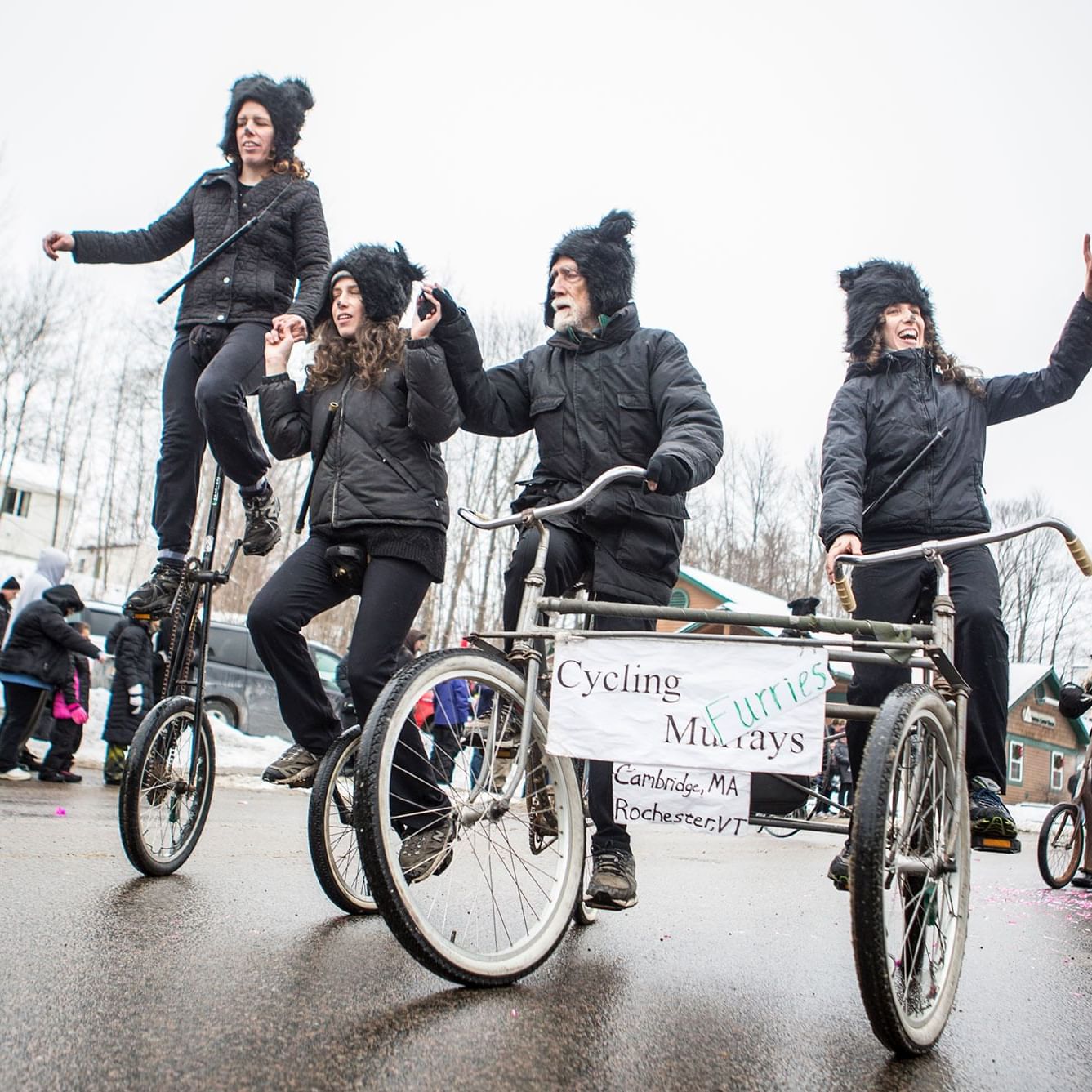 Unicyclists in the Saranac Lake Carnival near High Peaks Resort