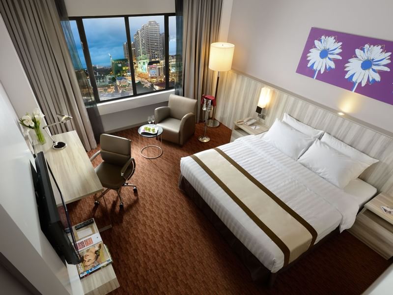 Upper view of Deluxe King Room with bed, sofa & work area at Sunway Hotel Georgetown