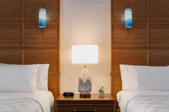 Table Lamp & Two beds at Oceanfront Suite in Holiday Inn Hotel