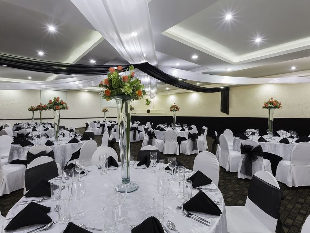 Salon A Hall with banquet tables arranged at Gamma Pachuca