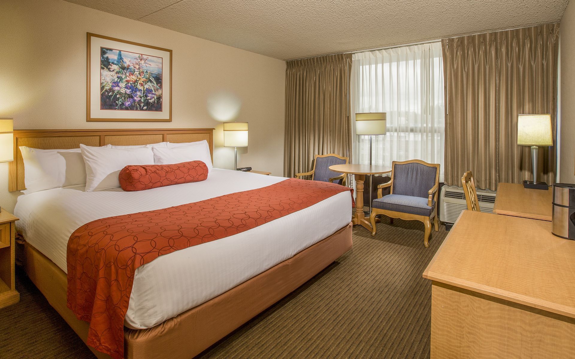 Bed in modern hotel room